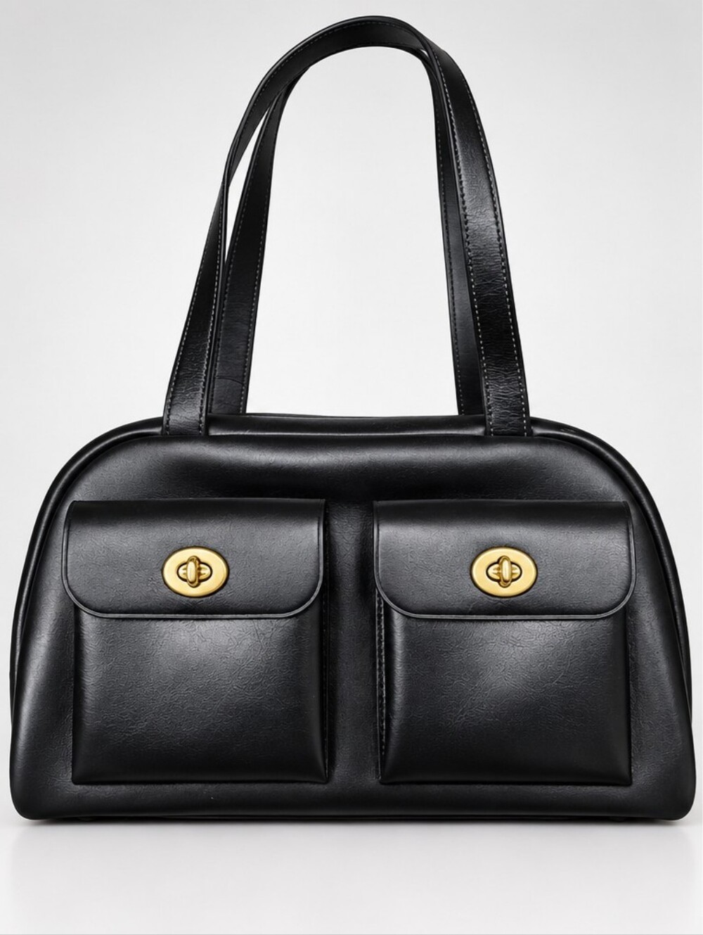 COACH Twin Turnlock Handbag in Black